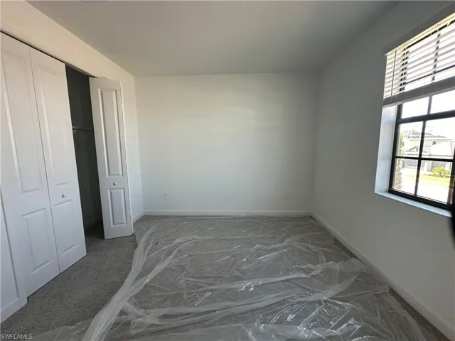Bedroom featuring a closet