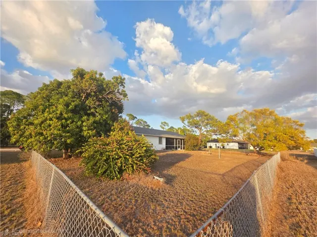 View of front of property featuring a fenced backyard