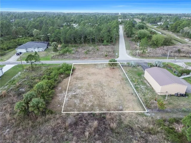 Aerial overview of property's location featuring property boundaries highlighted