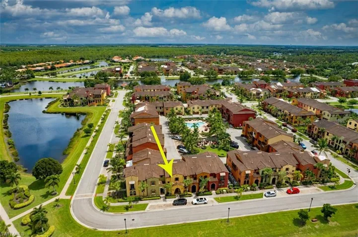 Aerial view of residential area with a nearby body of water