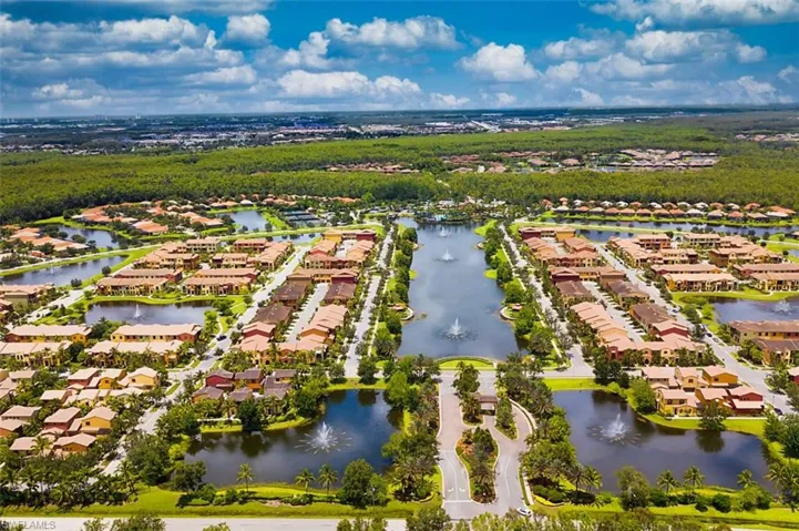 Aerial perspective of suburban area with a large body of water