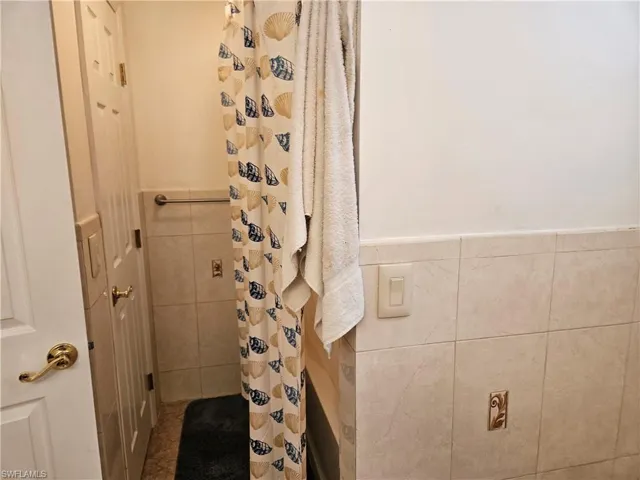 Bathroom with tile walls