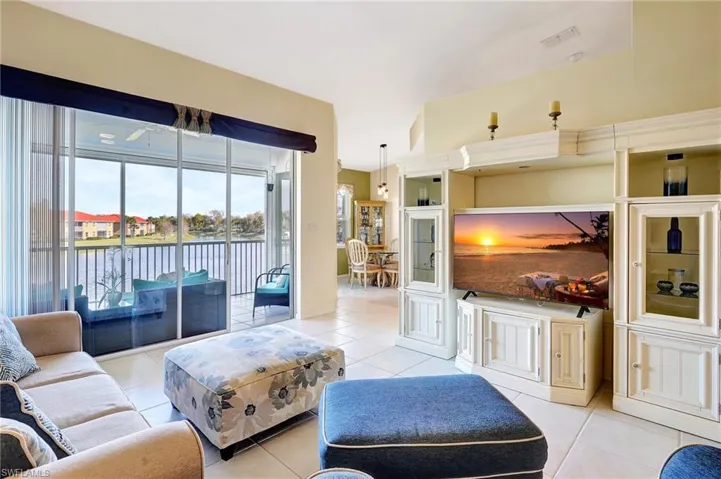 Tiled living area featuring visible vents