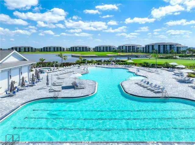 Community pool featuring a patio area
