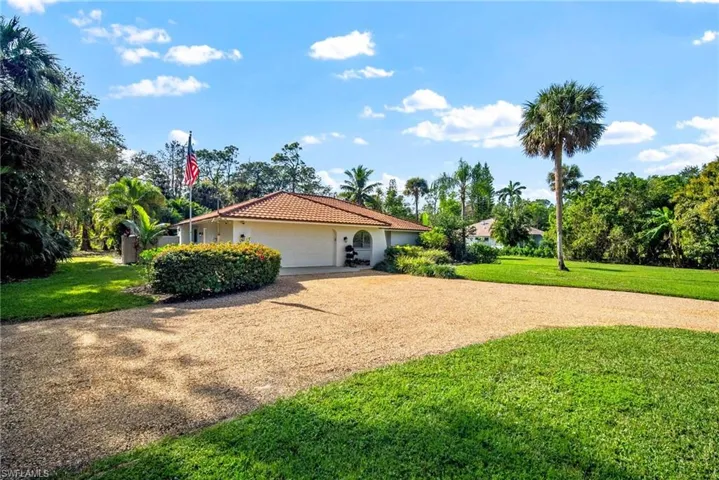 View of front of house with a front lawn