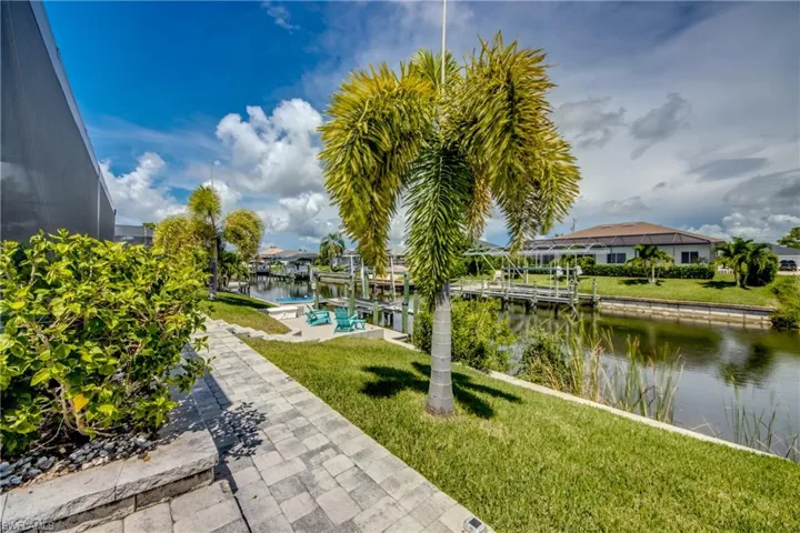 Paver path to the boat dock and canal