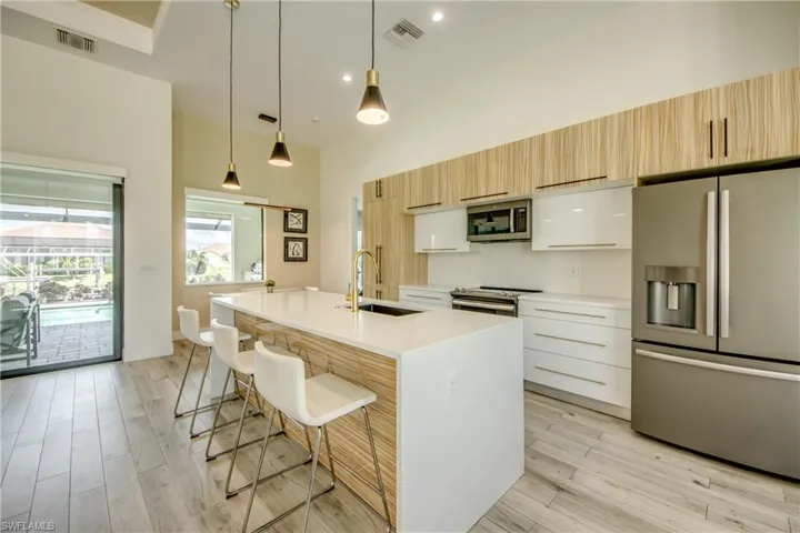 Kitchen featuring European style cabinetry