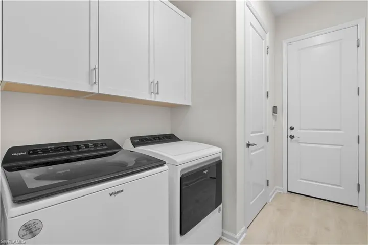 Laundry Room with Tons of Storage & Garage Entry
