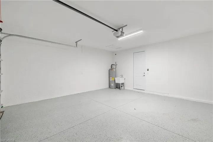 Two Car Garage with Epoxy Floor Coating and Wash Tub