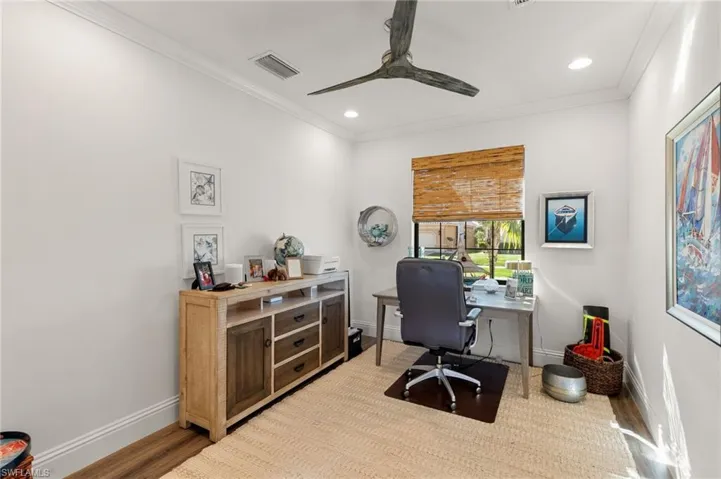 Office space with ceiling fan, recessed lighting, wood finished floors, and ornamental molding