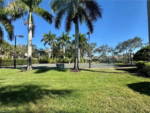 Surrounding community featuring community basketball court
