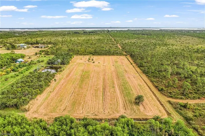 Aerial view of sparsely populated area with extensive farmland