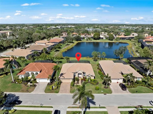 Aerial view of home on lake lot