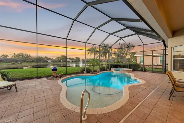 Pool/overlooking lake at sunset