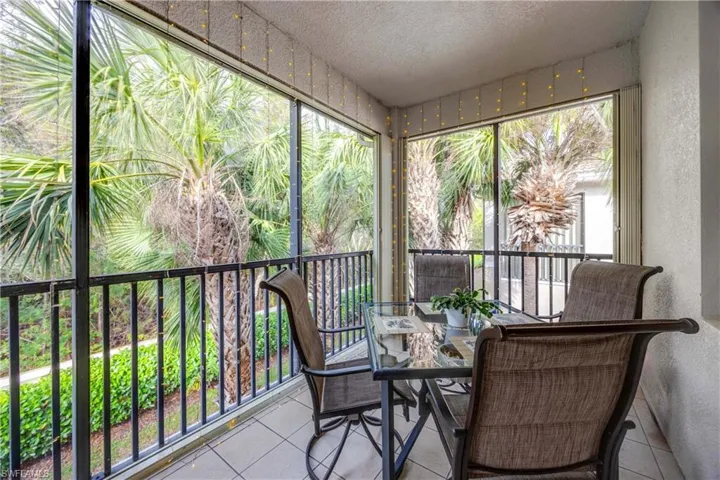Sunroom / solarium featuring a healthy amount of sunlight
