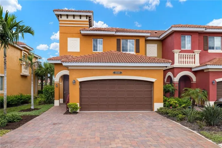 Mediterranean / spanish-style home featuring a garage