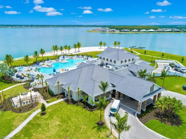 Lakefront beach, resort style pool, indoor and outdoor restaurant.