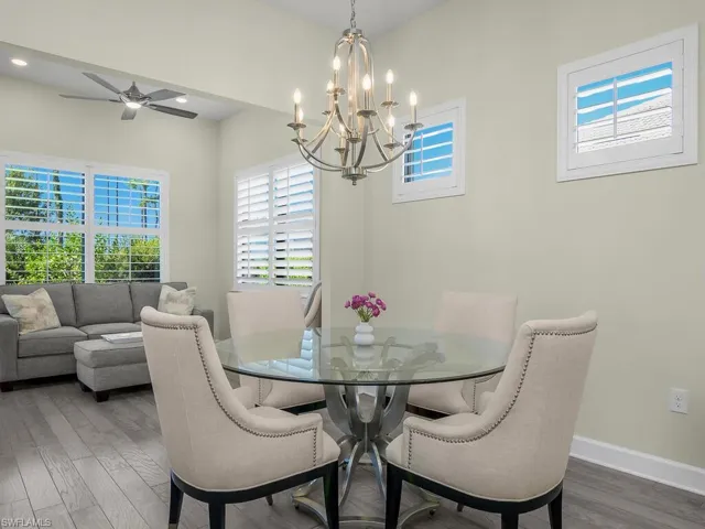 Dining area and adjacent sun room.