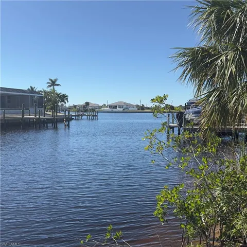 Water view featuring a dock
