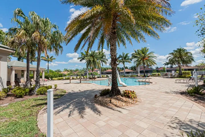 Community pool with a patio area