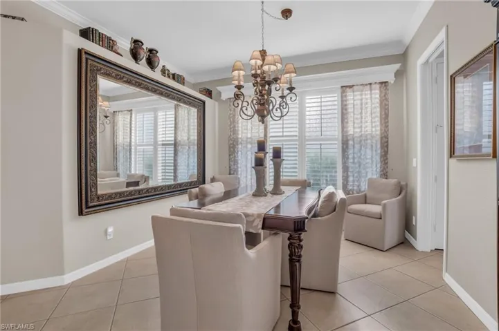 DINING WITH CUSTOM WINDOW CORNICE AND DRAPERIES