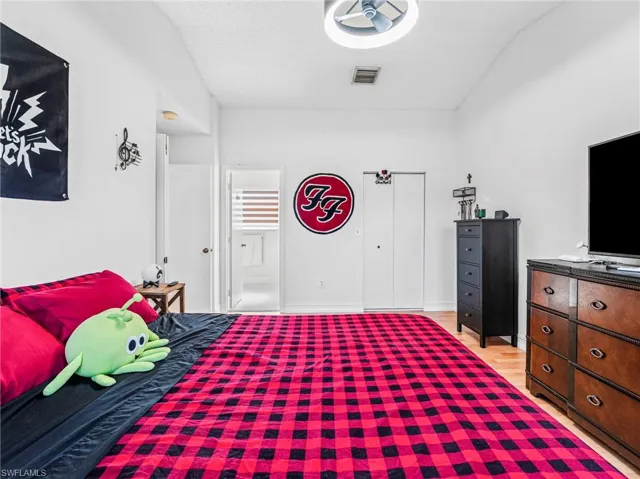 Bedroom with light wood-style flooring