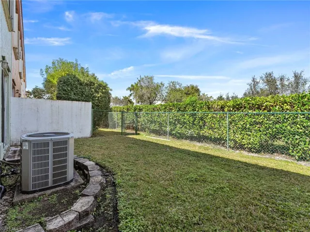 View of fenced backyard