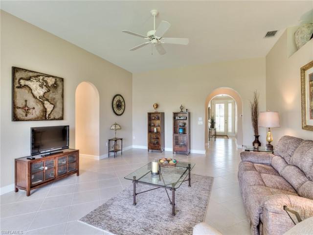 Entry hallway to the right and entry to kitchen on the left.  Large wall area can have a large wall mount TV.