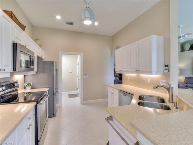 Upgraded S/S sinks and Moen faucet from Ferguson - not a box store model .  Laundry and garage at the rear of kitchen