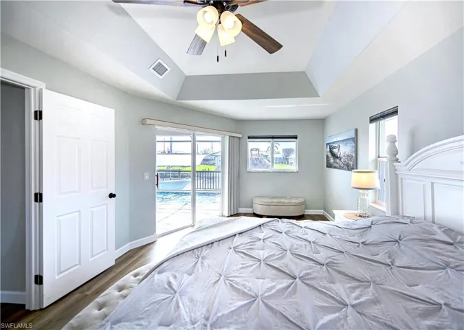 Access to the screened lanai from the master bedroom