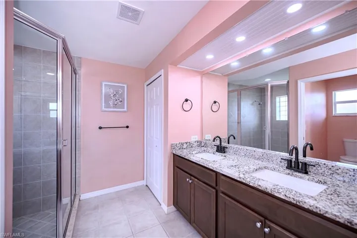 Master bath has double vanities