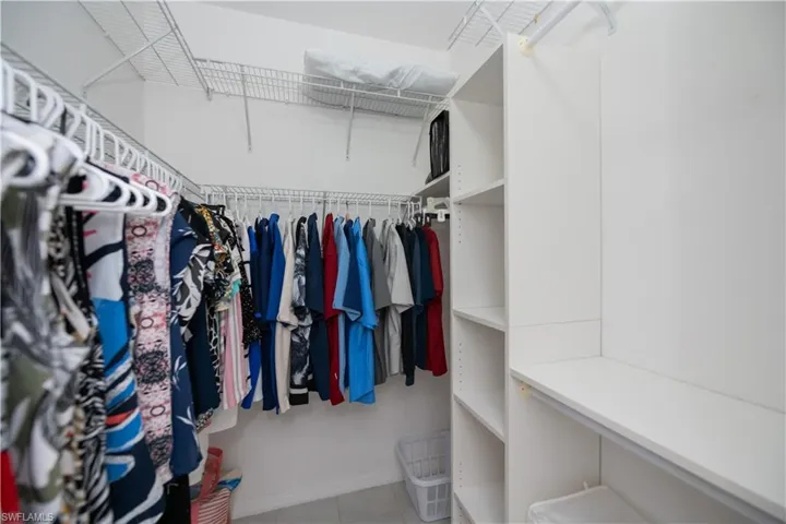 Two walk in closets in Primary bedroom