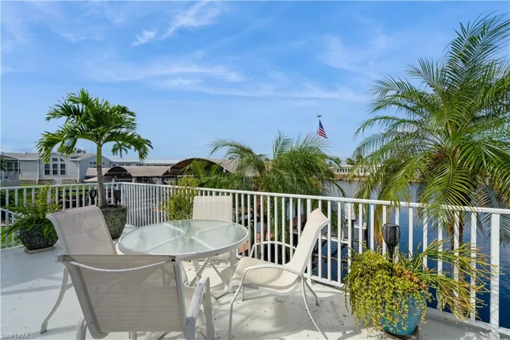 View of patio with a water view