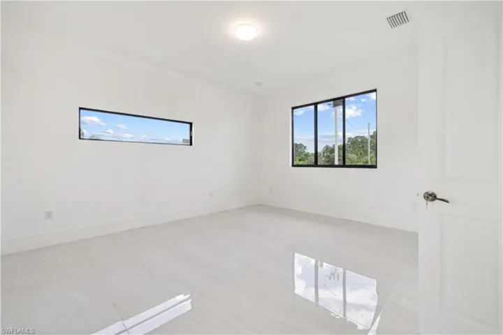 View of tiled spare room