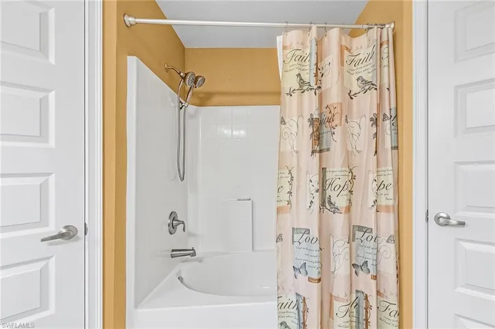 Bathroom with shower / tub combo