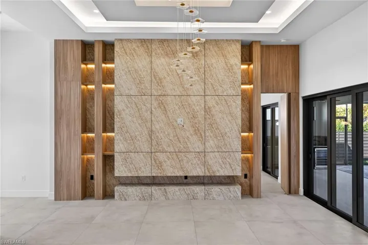 Building lobby featuring a raised ceiling