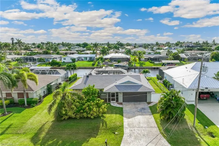 Aerial view of residential area with a large body of water