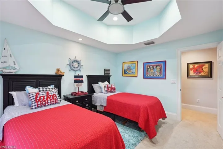 Bedroom featuring carpet flooring and ceiling fan