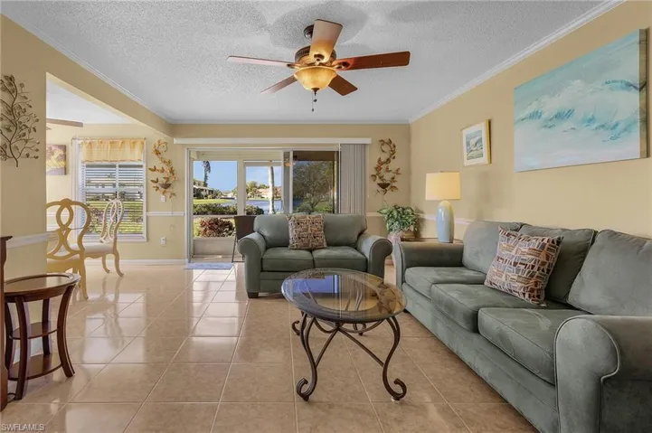 A few steps inside and your eye is drawn out to the e x p a n s i v e WATER views!