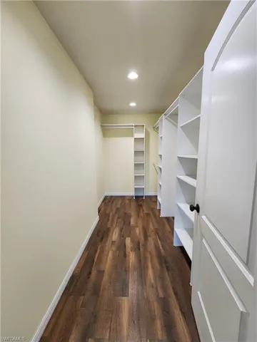 Primary Bedroom-Walkin Closet with Built-ins