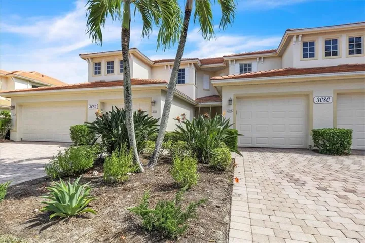 Mediterranean / spanish-style house featuring stucco siding and decorative driveway