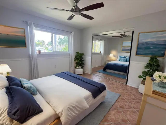 Tiled bedroom with ceiling fan