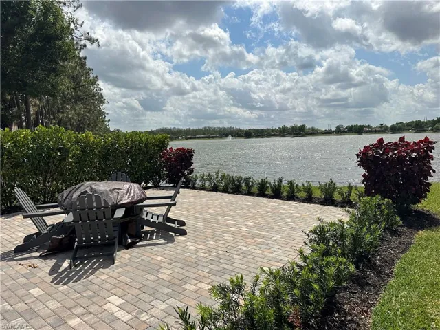 View of patio / terrace with a water view and grilling area
