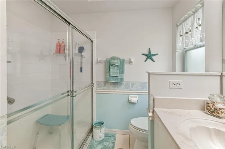 Master bedroom with walk-in shower