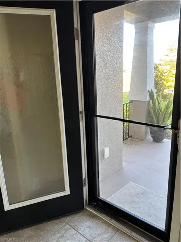 Front door with an additional storm door