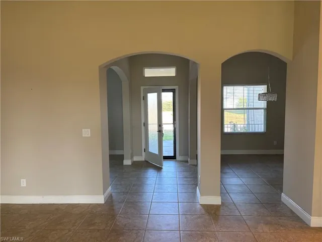 Entryway dining room on the right and flex room on the left