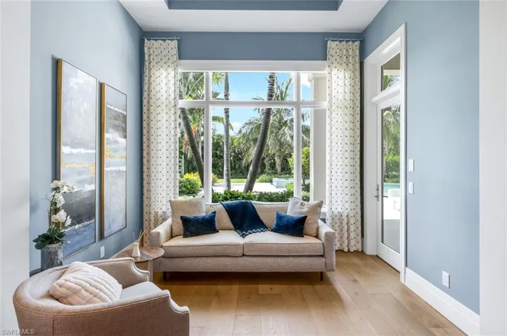 Primary suite sitting area by bay window