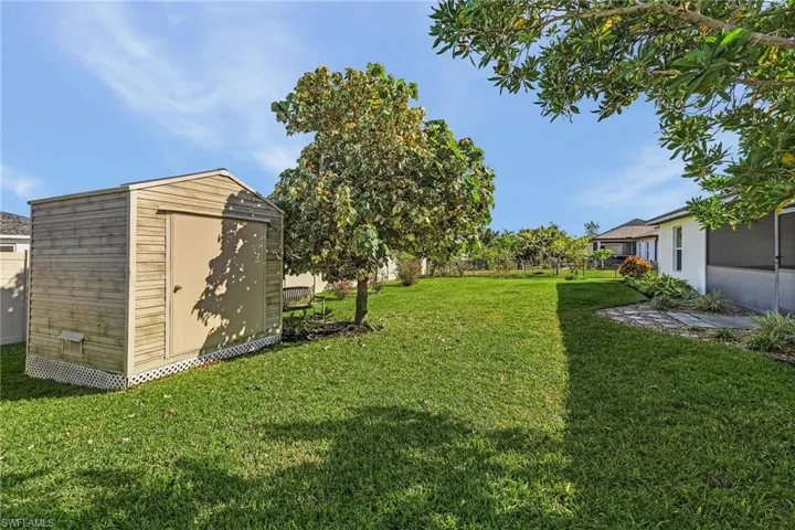 View of yard featuring a storage shed