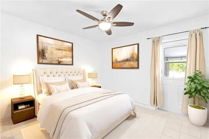 Tiled bedroom with ceiling fan