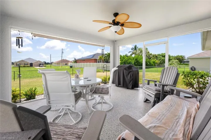 Sunroom / solarium with plenty of natural light and ceiling fan